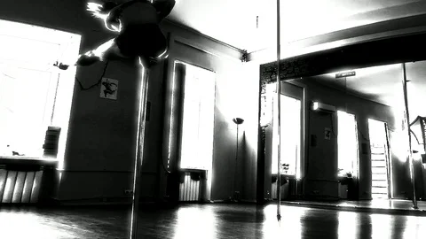 Lady Dancing On A Pole And Doing Tricks On The Front View In Black White Stock Footage 90130798