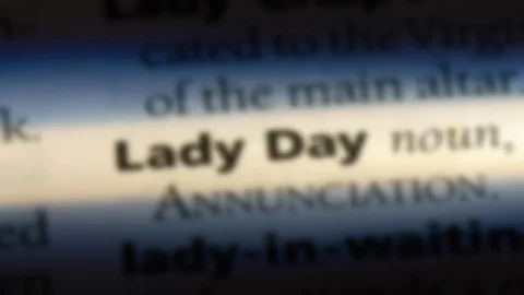 Lady day word in a dictionary. Stock Footage 99562036