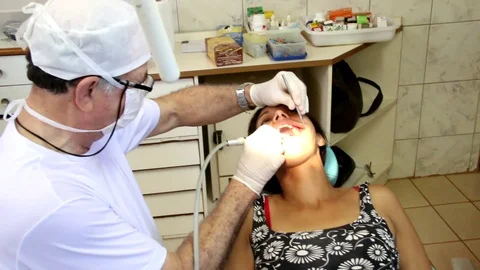 Lady at the Dentist Stock Footage 121324589