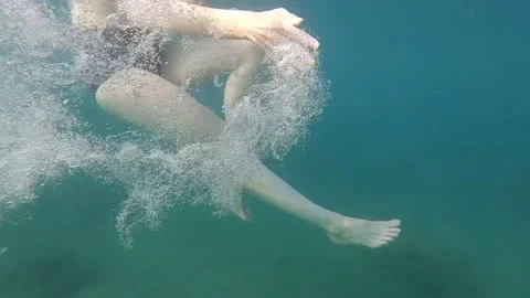 A lady diving on sea wave water Video stock 138340533