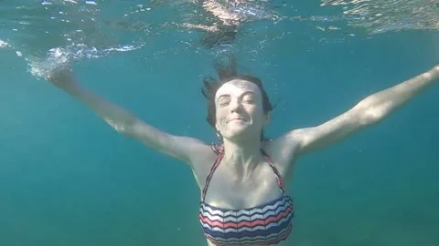 A lady diving on sea wave water Video stock 138340746