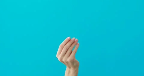 Lady does asking money gesture by fingers on turquoise Vídeos de archivo 150623479