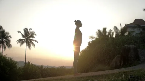Lady doing yoga exercises on track at sunrise slow motion 스톡 동영상 112262386