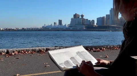 Lady Drawing Outdoor - Close Hands & Far Buildings - 03 Stock Footage