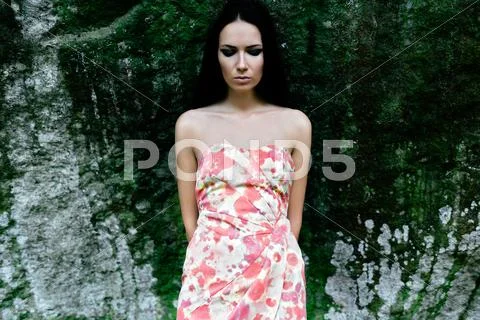 Lady in the dress with a floral pattern Stock Photos