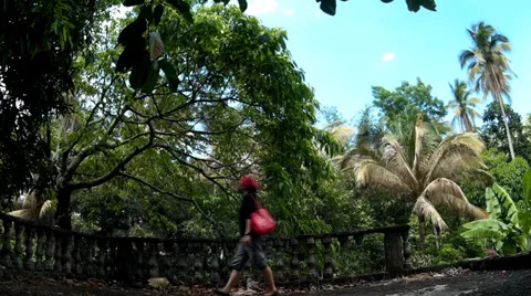 Lady explore ruined weathered building Stock Footage