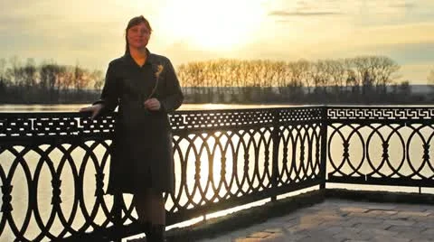 Lady With Flower Lean On Railings Stock Footage 11298620