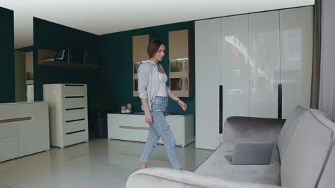 Lady Freelancer Using Laptop Working Online From Home Sitting On Sofa Indoor. Stock Footage 132784261
