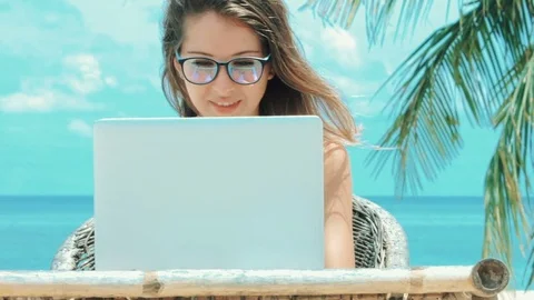 Lady freelancer working on the beach. Stock Footage 75993972