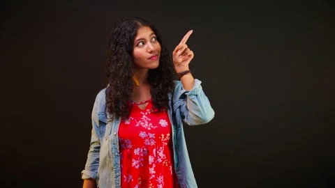 Lady gestures at raised area Stock Footage 302639785