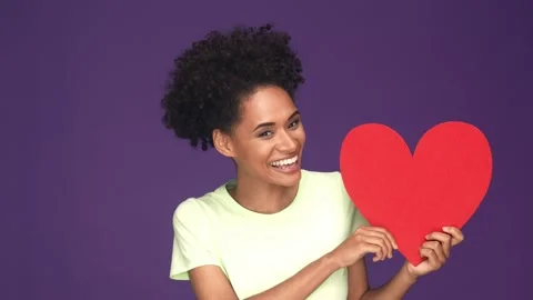 Lady get red heart postcard cuddle isolated violet color background Stock Footage 165879820