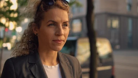 Lady going along the road Stock Footage 90717034