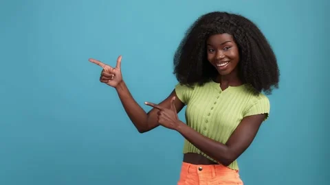 Lady hand empty space demonstrate discounts isolated blue color background Stock Footage 166902560