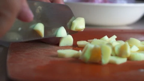 Lady hand using knife to chopping garlic 스톡 동영상 123283805