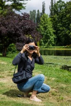 Lady having fun with camera Stock Photos