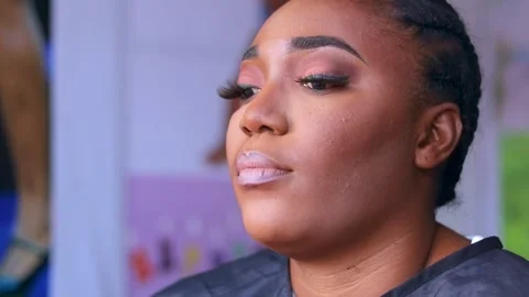 Lady having makeup Stock Footage 204949737