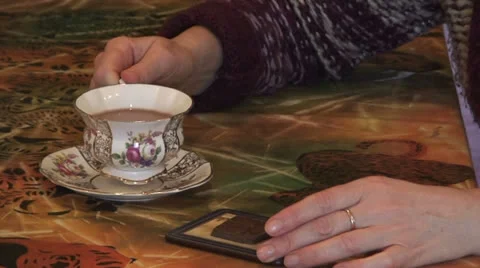 Lady having tea (1) Stock Footage 22939435