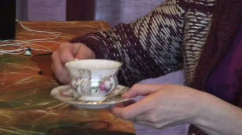 Lady having tea (2) Stock Footage 22940044