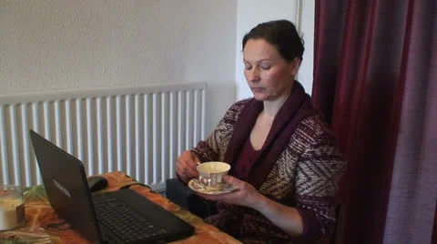 Lady having tea (3) Stock Footage 22940745