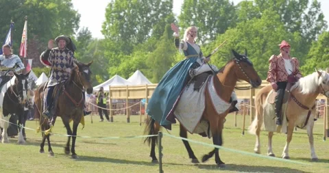 Lady of the Joust Leads a Medieval Horse Parade at Leeds Castle Stock Footage 340264786