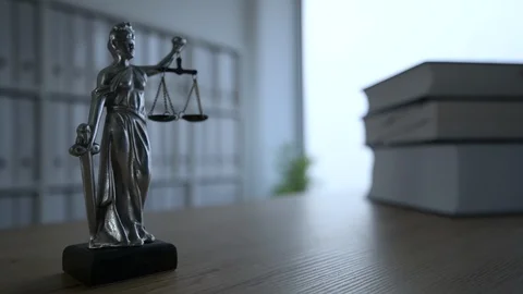 Lady Justice statue in dark empty law firm office Stock Footage 103959546