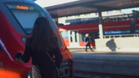 Lady late for train, running on platform, life in modern city, time-management Video stock 106651636