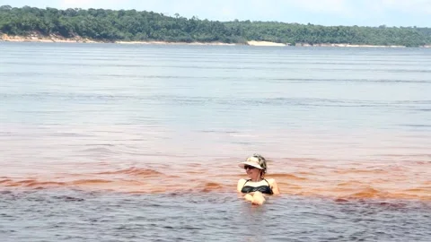 Lady Laying Down on a Sand Bar Video stock 222993529