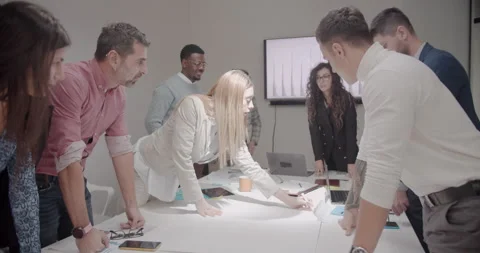 Lady leading the team for the brainstorming session Stock Footage 239165671