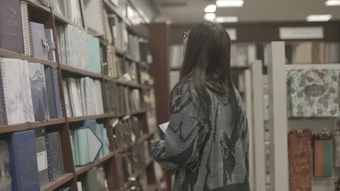 Lady In Library Slow Motion Stock Footage 83603775