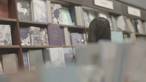 Lady In Library Slow Motion Stock Footage 83603777