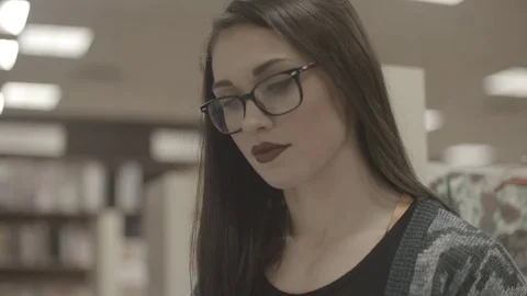 Lady In Library Slow Motion Stock Footage 83603822