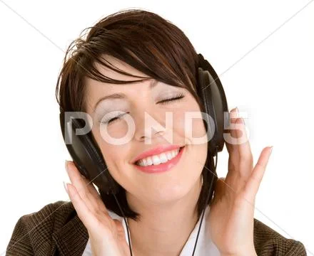 Lady listening to music with headphones Stock Photos