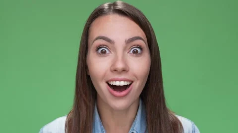 Lady look bargain message open mouth scream isolated green color background Stock Footage 166045006