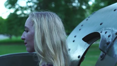 Lady Looking Off In The Distance Then To Camera, On Cannon Stock Footage 158849386
