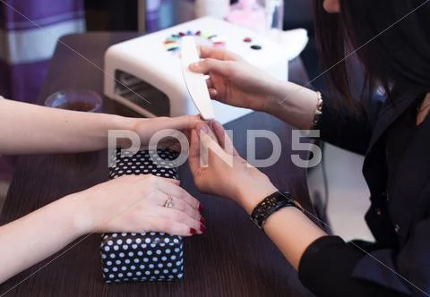 Lady Make Manicure In Salon