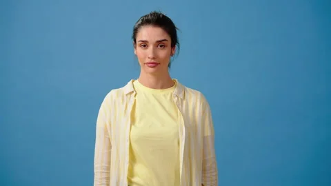 Lady makes blah blah gestures and rolls eyes up in annoyance Stock Footage 244173138