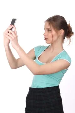 Lady with makeup taking selfie. Close up. White background Stock Photos