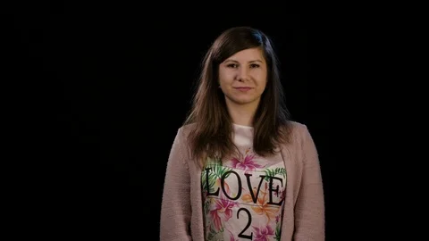 A Lady Making a Heart Gesture Stock Footage 86587392