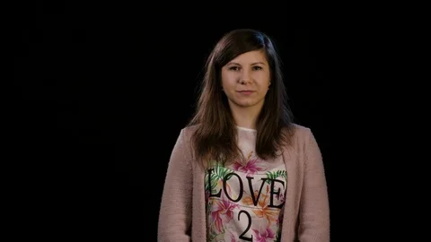 A Lady Making a Heart Gesture Stock Footage 86587805