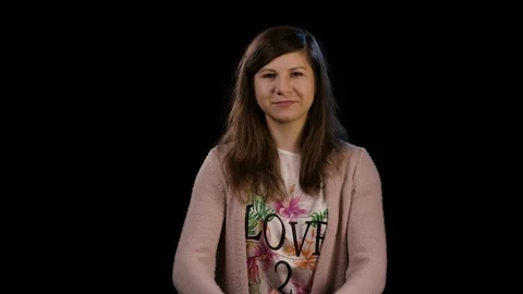 A Lady Making a Heart Gesture Stock Footage 86588522