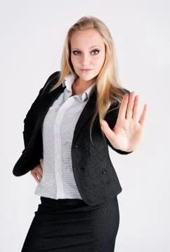 Lady making stop gesture Stock Photos
