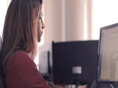The lady Manager passes the documents to a colleague Stock Footage 82137063