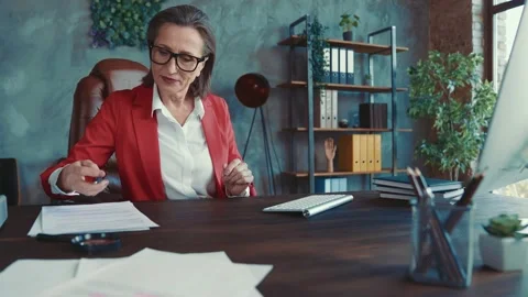 Lady marketer sit desk prepare project use device write paper in workspace Video stock 167597881
