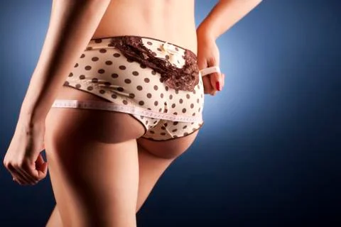 Lady measuring herself Stock Photos