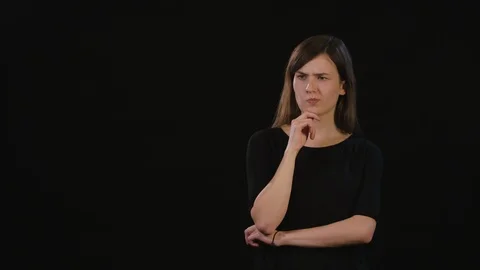 A Lady Mimicing Against a Black Background Stock Footage 87166964