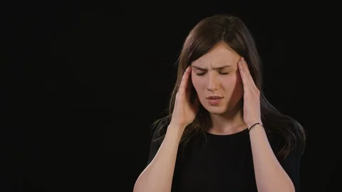 A Lady Mimicing Against a Black Background Stock Footage 87176397