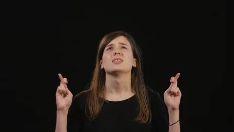 A Lady Mimicing Against a Black Background Stock Footage 87186344