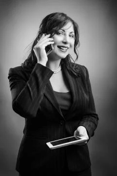 Lady multi tasking Stock Photos