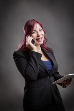 Lady multi tasking Stock Photos