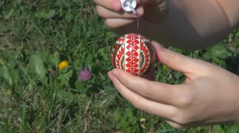 Lady painting Easter egg springtime handicraft decorative decoration traditional Stock Footage 12133159